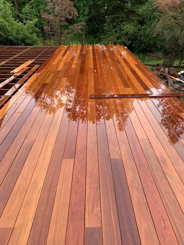 Hardwood decking, going down in the rain