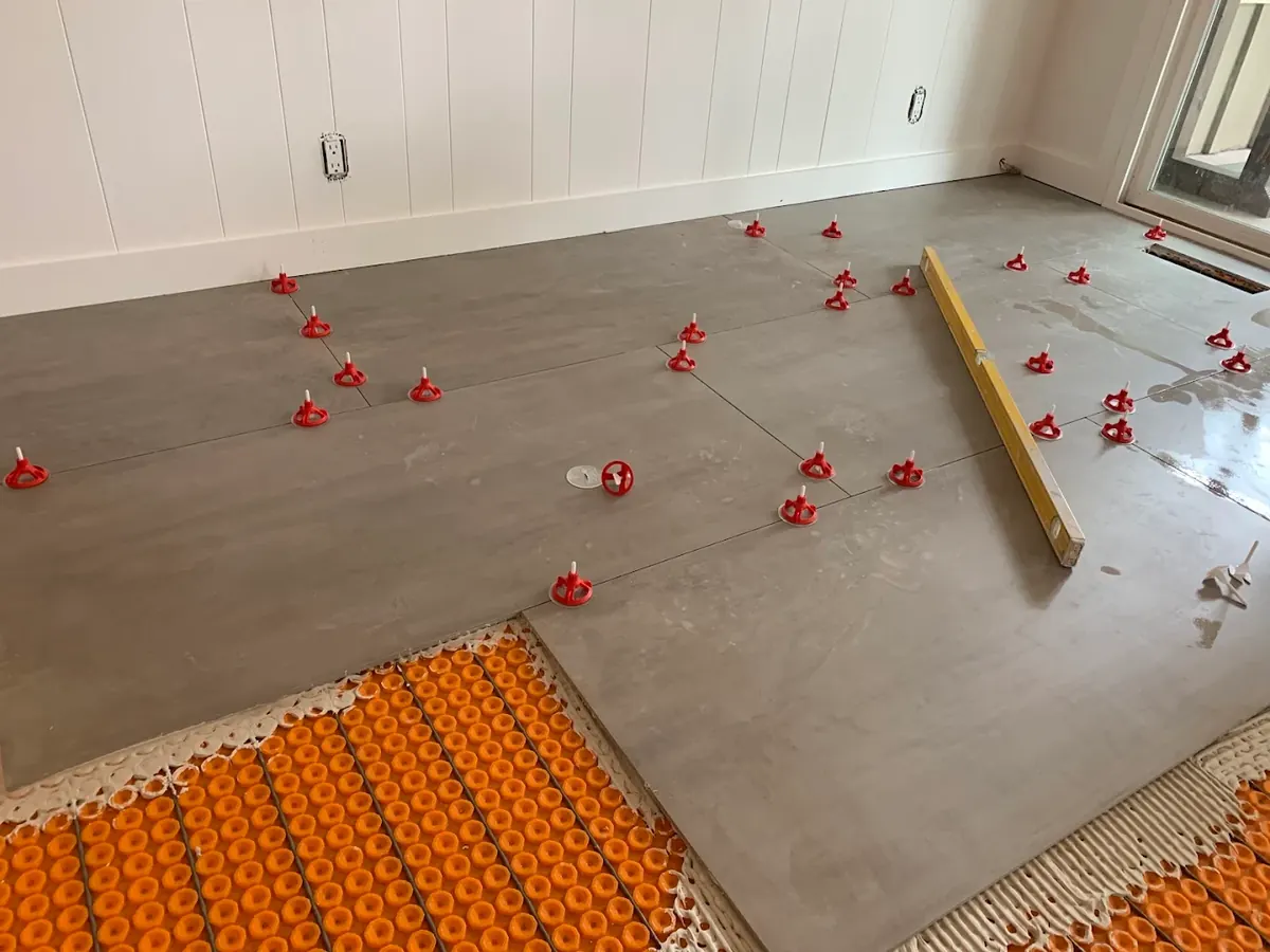 Large-format tile set over radiant floor heat